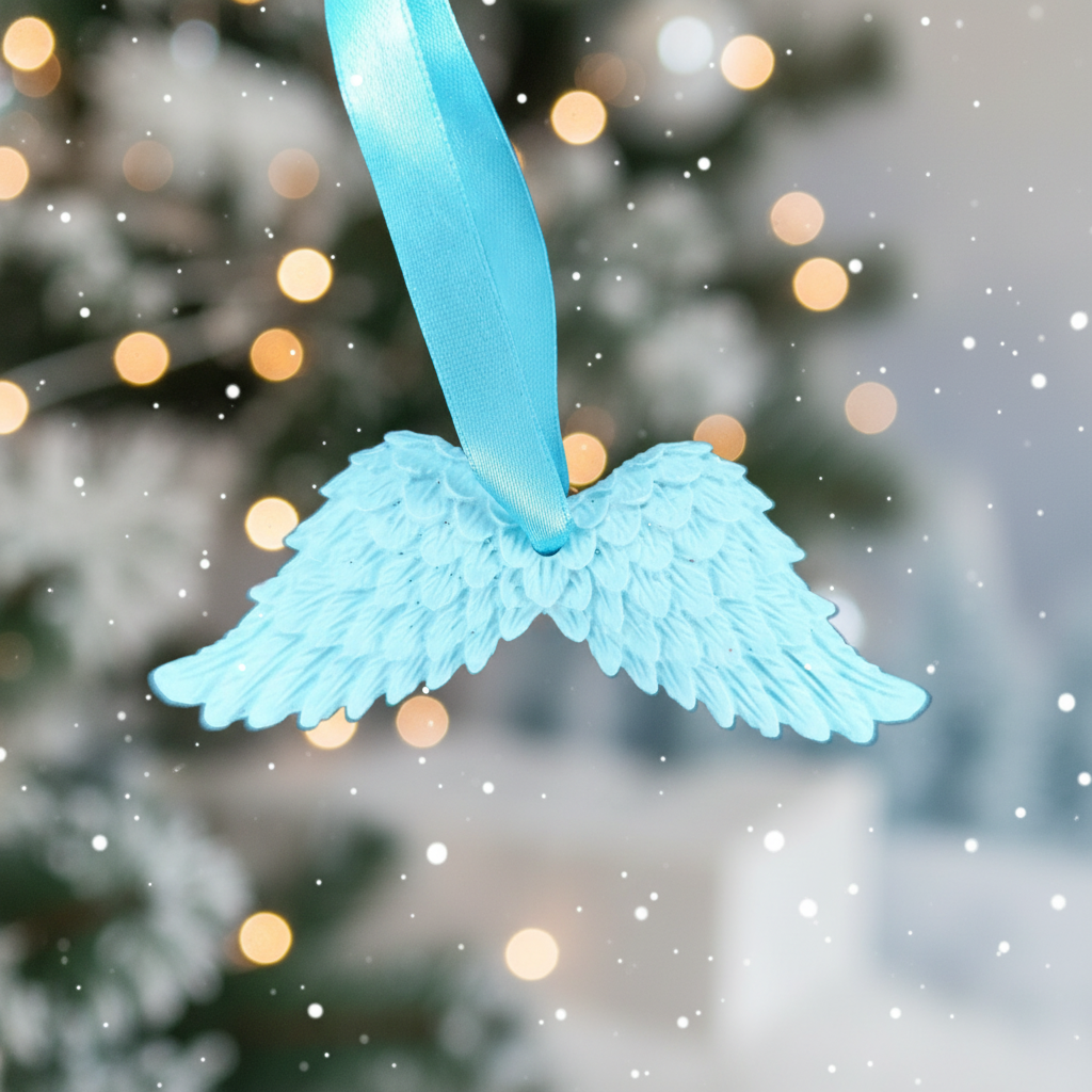 Pale blue angel wings with festive background