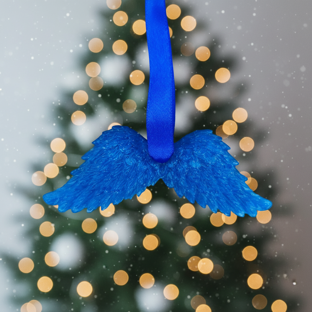 Royal blue glitter angel wings with festive background
